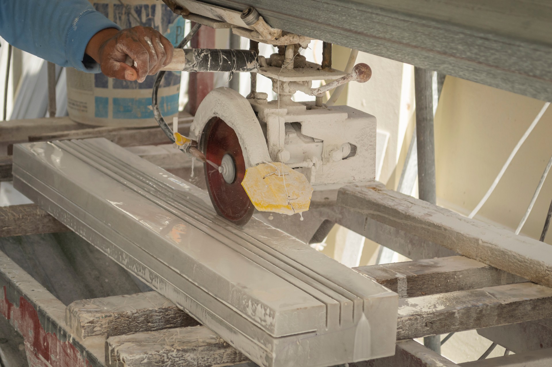 The marble is being cut with a cutting machine.